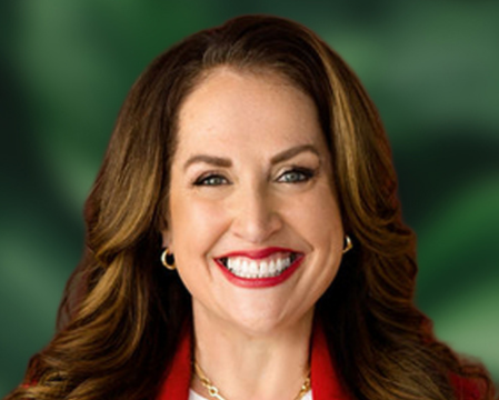 Debra on green and black background.